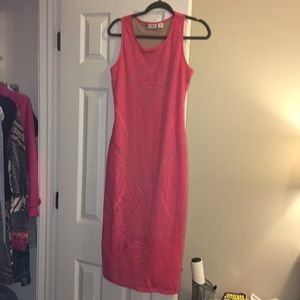 A salmon bodycon dress
